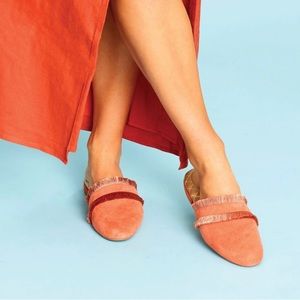 Birdies Ani Fringe Suede Slip On Mules in Coral